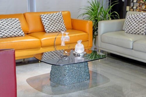 Stitch Rectangle Table with glass top and carbonate-stitched polycarbonate base