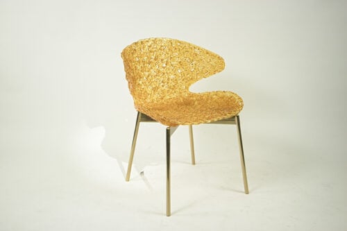 Swan Chair with iconic form and energizing lighting reflection