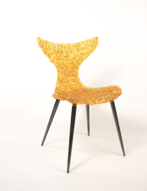 Innovative Chair inspired by fish movement with light-catching sculptural form