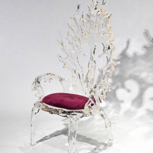 Éclat Royale Chair with commanding transparent silhouette and refined seat